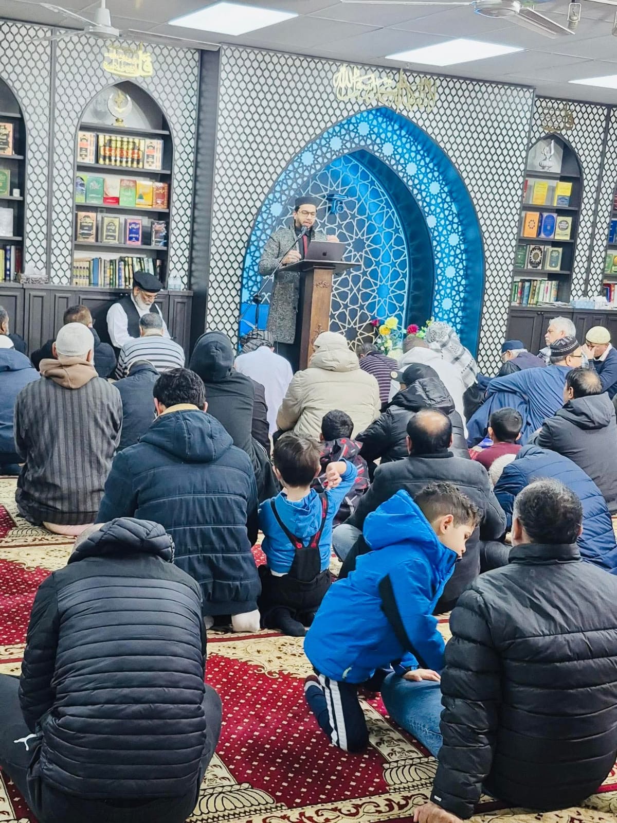 Syed Najam speaking with a Canadian Muslim community audience