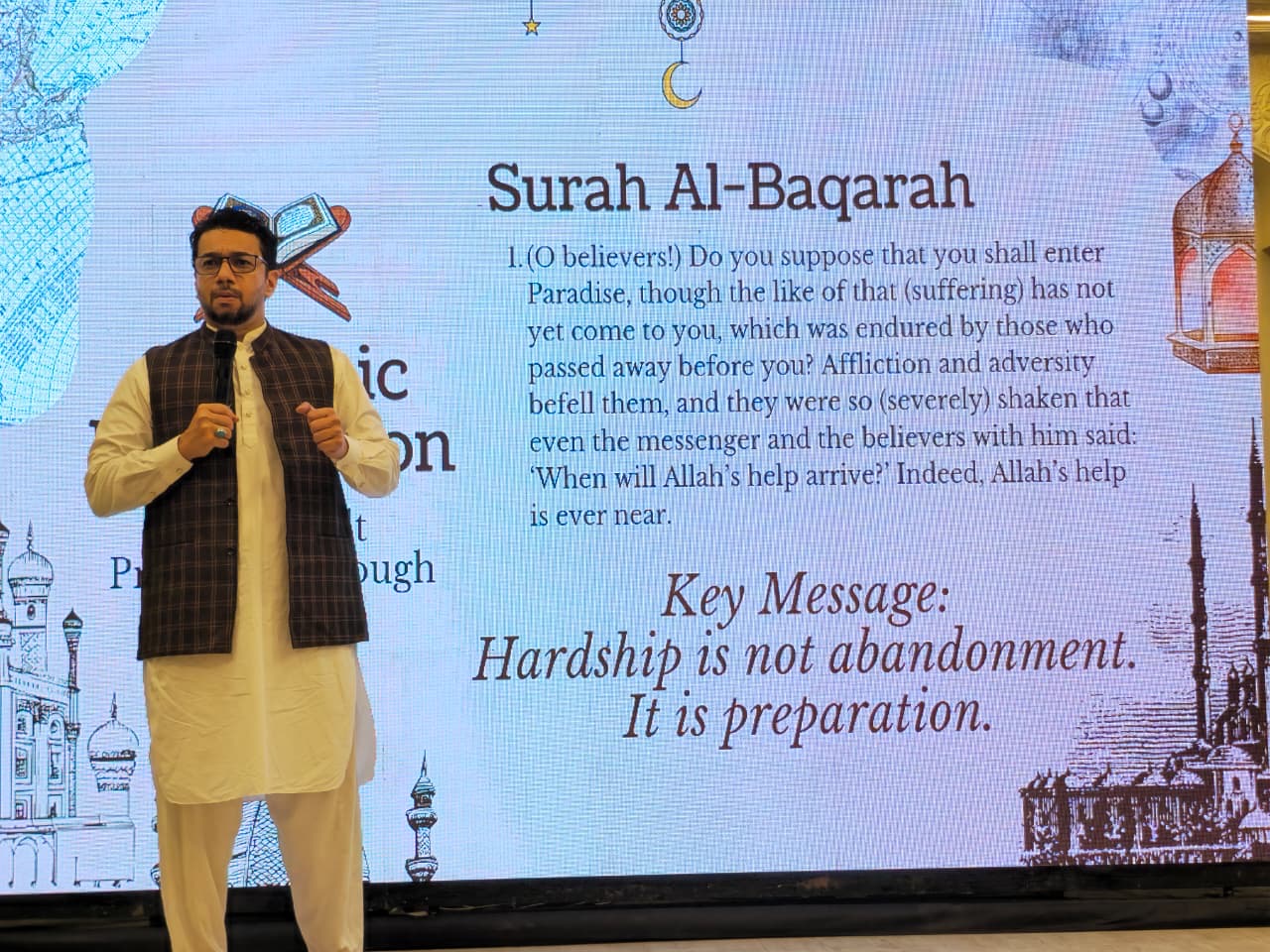 Syed Najam presenting Installing the Seerah on stage